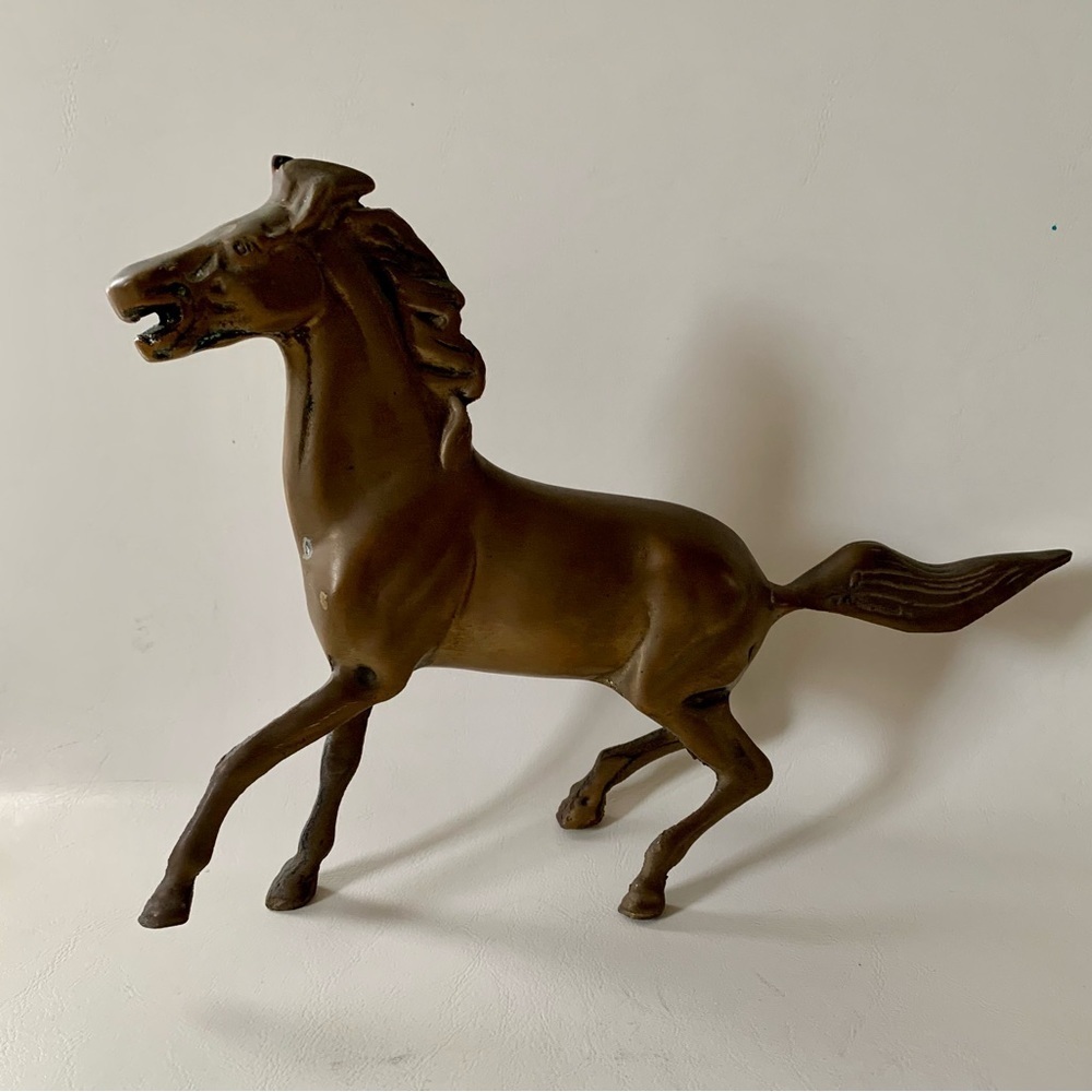 vintage cast metal horse figurine